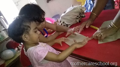 children making paper bags