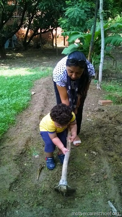 children planting neem seeds at nursery school (6)