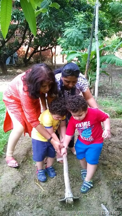 children planting neem seeds at nursery school (7)