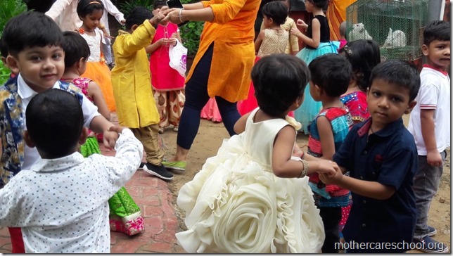 Playgroup children  learning about gratitude to those who nurture and care for us like the teachers, ayahs, van bhayiyas, trees and plants and Moolchand mali bhaiya by tying rakhis (1)