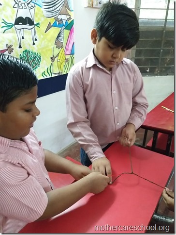 With handmade pom pom rakhis.. (1)